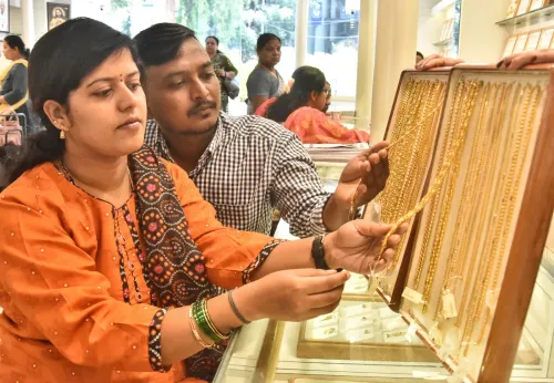 Gold, silver rise up to 1% on weaker dollar, easing inflation fears