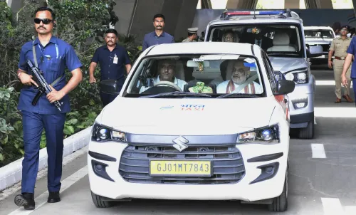 Amit Shah rides Bharat Taxi in Gandhinagar after Gujarat launch