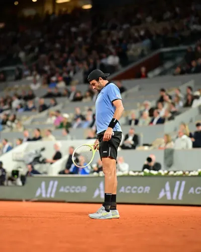 Berrettini retires hurt at Roland Garros QF, Arnaldi advances