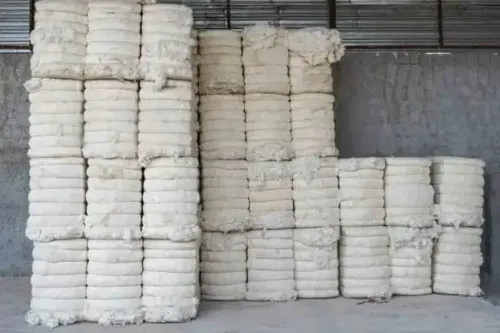 How has the exemption of import duty on cotton benefited the textiles industry?