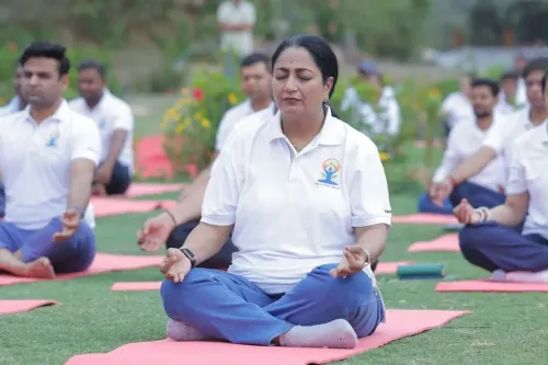 Delhi CM Rekha Gupta leads Yoga Day at Asola-Bhati Blue Lake