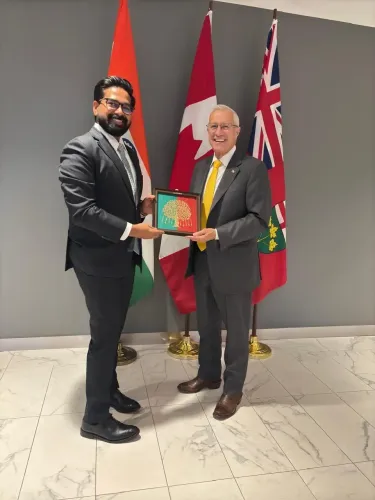 How is the Indian envoy enhancing economic ties with Canadian Minister Victor Fedeli?
