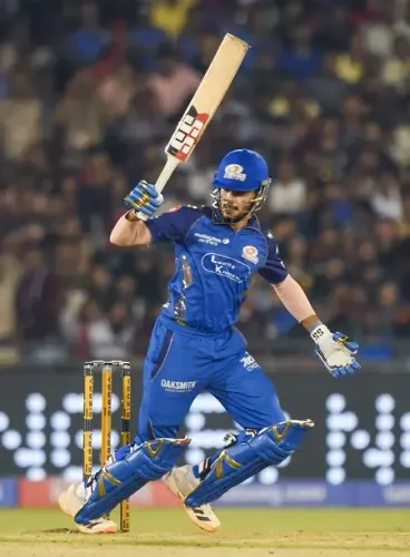 Bhuvneshwar's 4-23 puts RCB on top, but Tilak's 57 lifts MI to 166/7