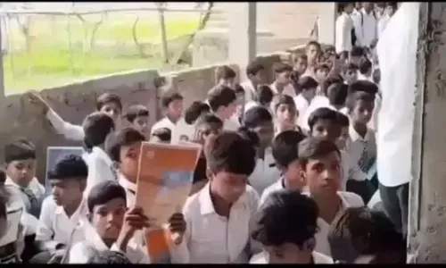 Jal Shakti Minister Paatil distributes water-conservation notebooks in Varanasi