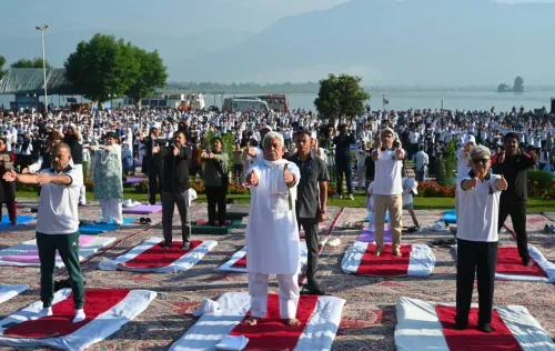 Yoga Day 2025: J&K L-G Sinha leads thousands at Dal Lake, Jammu events draw forces