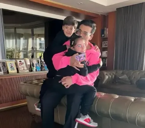 Karan Johar shares cuddle moment with twins Roohi & Yash, asks 'What can replace this joy?'
