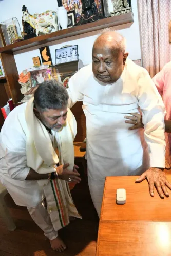 Shivakumar seeks Deve Gowda's blessings before Karnataka CM oath