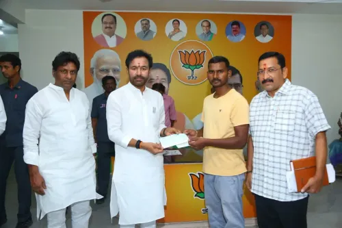 Kishan Reddy Hands Medical Relief Cheque to Suryapet Family