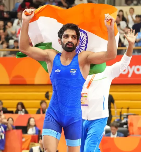 एशियन गेम्स 2026 गोल्ड: अमन सहरावत ने 57 किग्रा फ्रीस्टाइल में वर्ल्ड चैंपियन को 11-7 से हराया