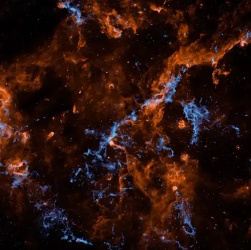 NASA के SPHEREx मिशन ने खींची 'मॉलिक्यूलर क्लाउड' की अनोखी तस्वीर, ब्रह्मांड में बर्फ के रहस्य से उठा पर्दा
