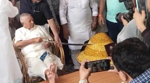 Is Lalu Yadav's Sword-Cutting Cake Gesture Igniting a Political Storm?