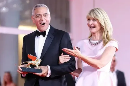 George Clooney receives Golden Lion at Venice Film Festival, Laura Dern presents