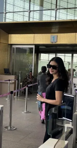 Mouni Roy apologises to airport staffer after accidental stumble in Mumbai