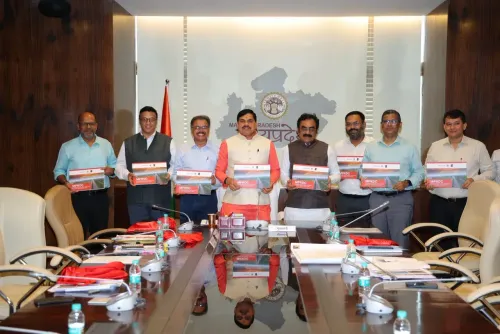 MP CM Mohan Yadav Releases MP RDC Infrastructure Coffee Table Book