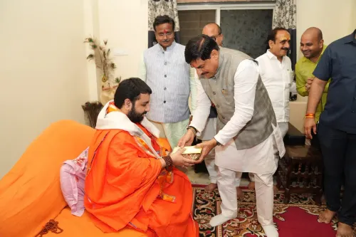 MP CM Mohan Yadav Seeks Blessings of Acharya Shekhar Ji Maharaj in Ujjain