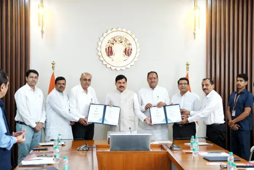 What Agreements Did the MP Government Sign for River Conservation and Village Development?