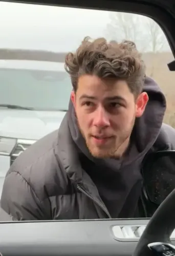 Did Nick Jonas Playfully Hit Joe Jonas' Windshield with a Snowball to Announce His New Single?