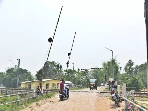How is Northeast Frontier Railway Enhancing Safety Measures at Level Crossing Gates?
