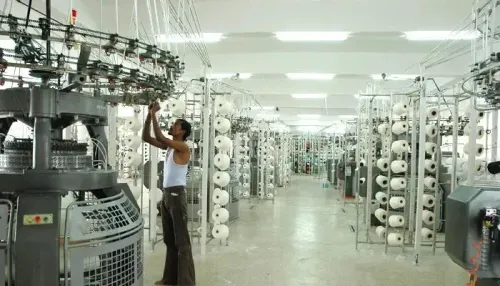 What is the new wage pact for TN's Tiruppur knitwear workers?