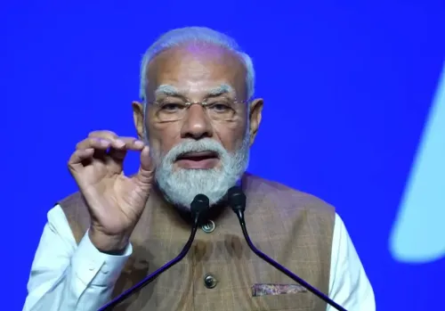 Modi calls Paris 'city of lights' at diaspora meet, cites 12 years in office