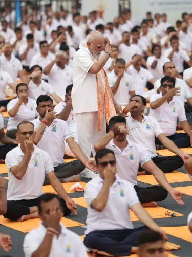 PM Modi Shares Glimpses from Yoga Day Event in Kolkata