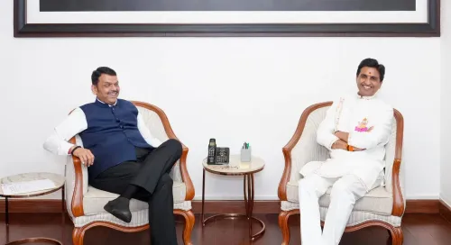 Poet Kumar Vishwas Calls on CM Fadnavis at Varsha Bungalow
