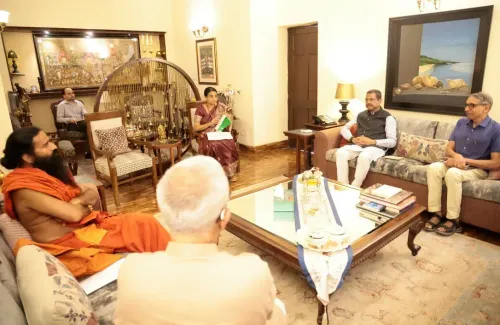 Pradhan Meets Ramdev, Backs Yoga for Youth Health