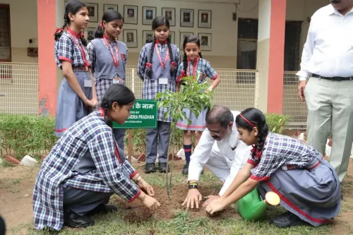 Pradhan plants sapling at Delhi Cantt KV on World Environment Day