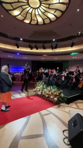 Pradhan Receives Musical Welcome in Australia