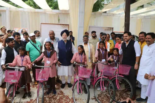 Puri Distributes Cycles to Girls, Hails Sonbhadra's Rise