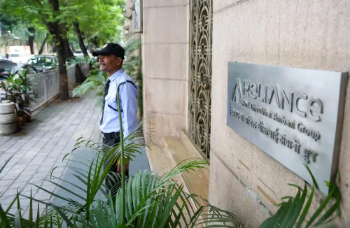 Did ED Raids on Anil Ambani Firms Cause Reliance Infra and Power Shares to Plummet?