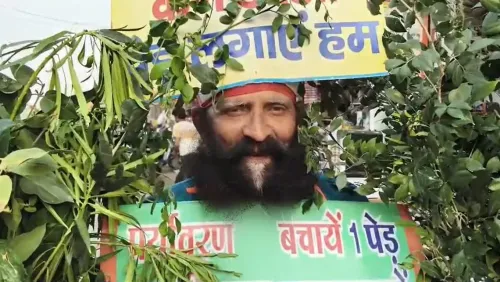 प्रयागराज: शरीर पर स्लोगन लिखकर पेड़-पौधे लिए घूम रहे राजेंद्र तिवारी, विश्व पर्यावरण दिवस पर अनोखी मुहिम