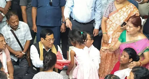 Sonowal visits Sivasagar flood relief camp, directs aid