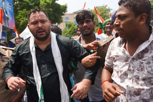 Tejashwi Yadav detained in Patna as police use water cannons on RJD march
