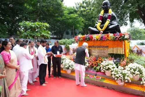 Did Telangana Governor and CM pay tribute at Bapu Ghat in Hyderabad?