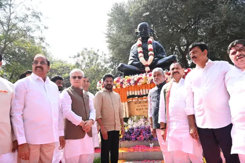 Telangana Officials Honor Mahatma Gandhi at Bapu Ghat