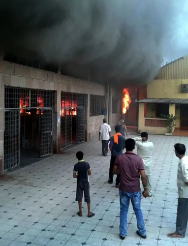 What Caused the Train Service Disruption in Sealdah South Due to a Fire at Santoshpur Station?