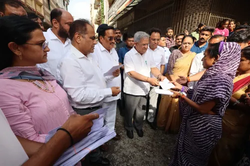 Surat flood relief: CR Paatil distributes cash aid to families in Godadara