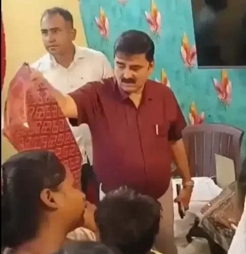Did a Video Capture a Cop Distributing Sarees from CM?