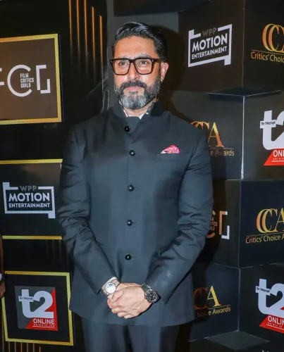 Abhishek Bachchan humbled by Amitabh after Dhoom success party