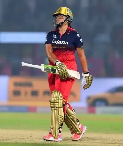 Can Mumbai Indians Withstand Richa Ghosh's Late Charge to Secure a 15-Run Victory Over RCB?