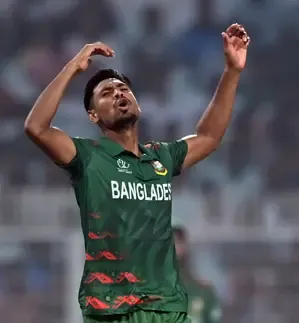 Why Did Spiritual Guru Devkinandan Thakur Criticize KKR and Shah Rukh Khan Over a Bangladeshi Player?