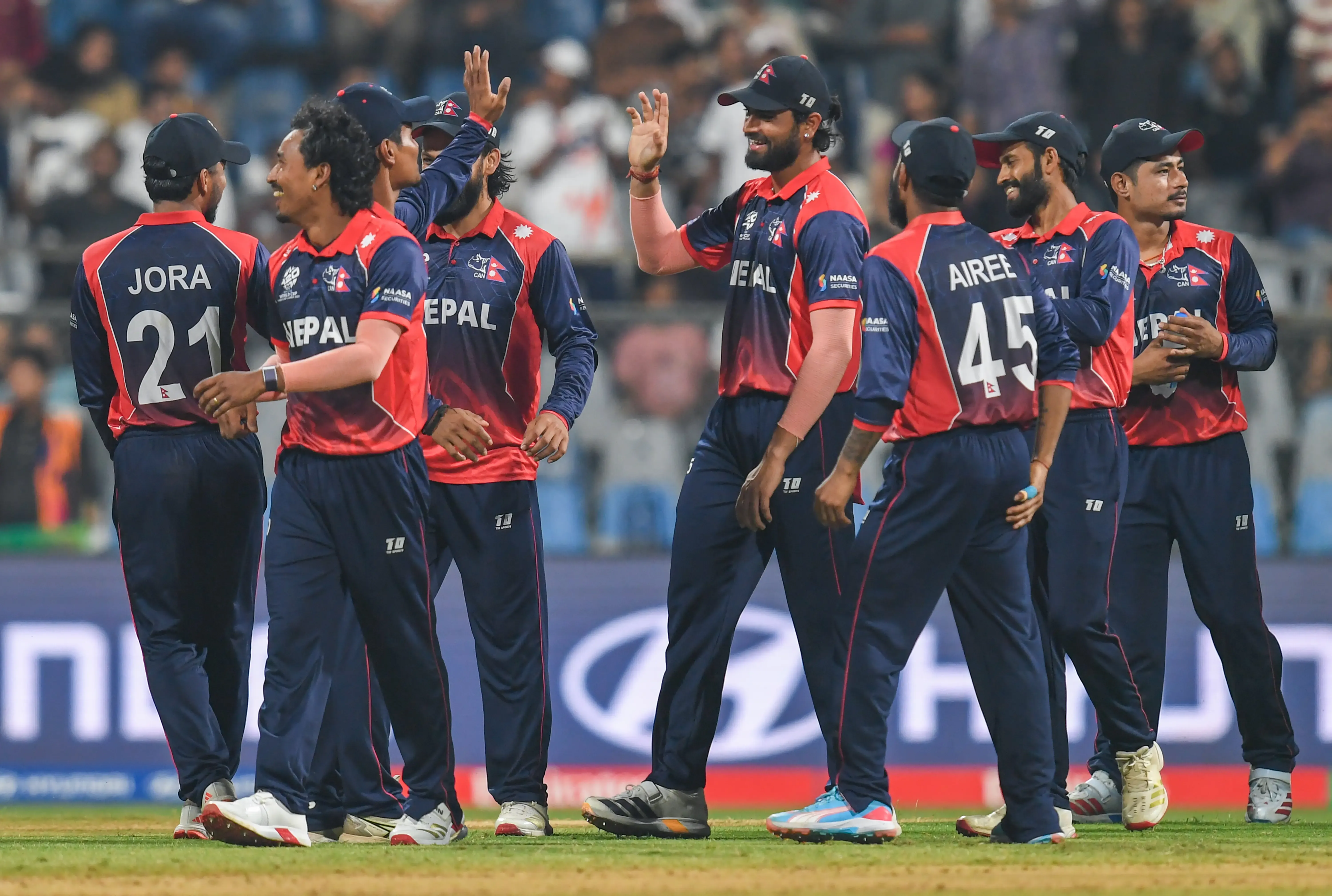How Did Nepal Restrict Scotland to 170/7 After Jones's Fifty?