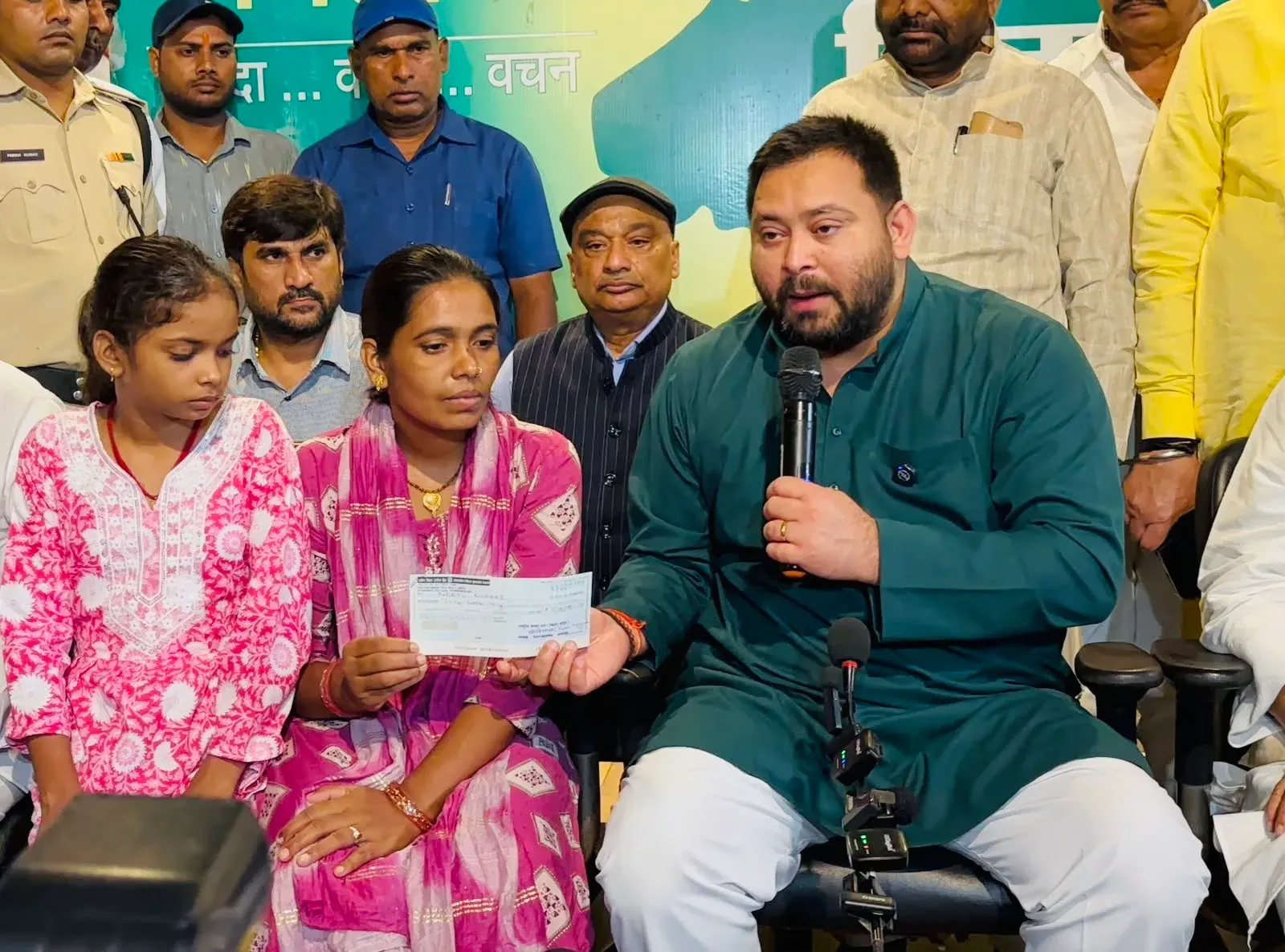Tejashwi Yadav hands Rs 5 lakh cheque to Bunty Yadav's family