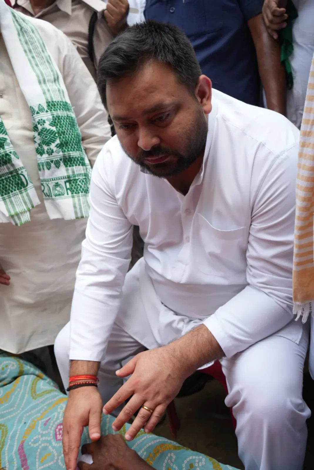 Tejashwi Yadav visits kin of worker shot dead over wages in Sasaram