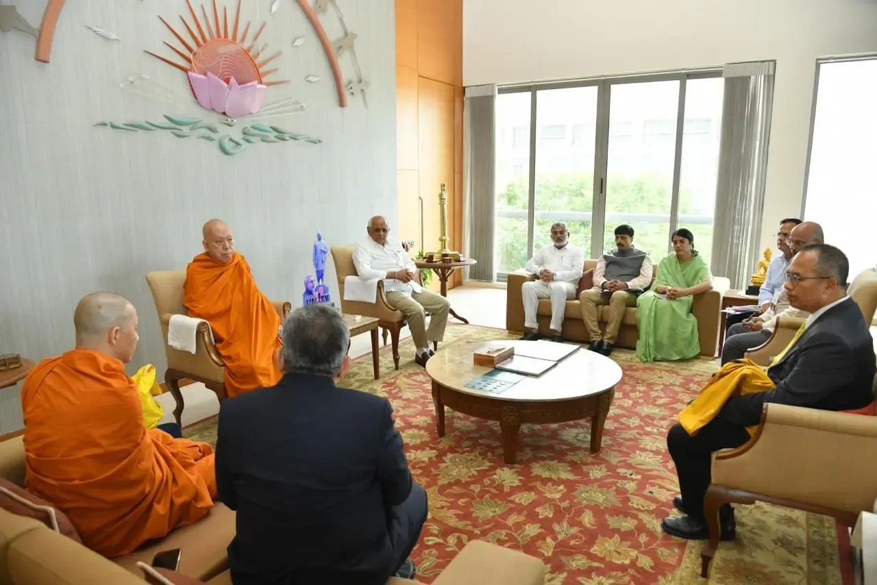 Why is the Thai Buddhist leader visiting Gujarat?