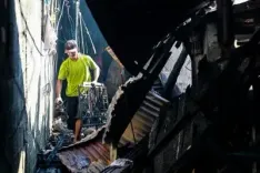 1 dead, 1 wounded in residential fire in Philippine capital