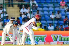 How did John Campbell score 115 as WI reach 252/3 at lunch on Day 4, trailing India by 18 runs?