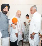 Amit Shah visits Mansa family of slain anti-drug activist Jhota