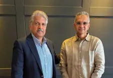 Anand Mahindra meets NPCI chief, switches to BHIM app